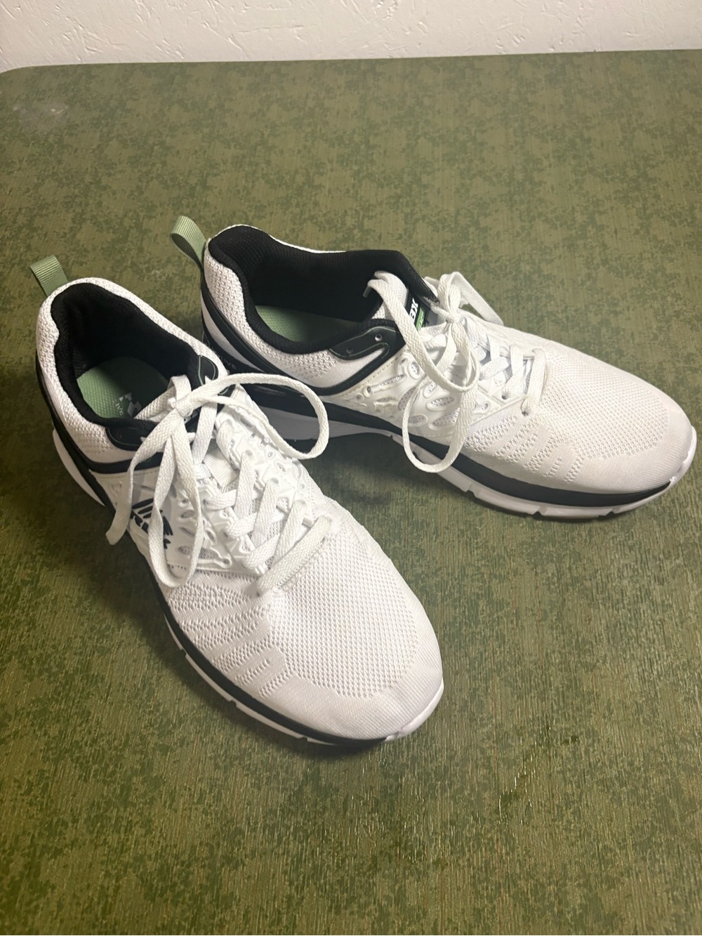 Reebok White Athletic Sneakers with Black and Green Accents